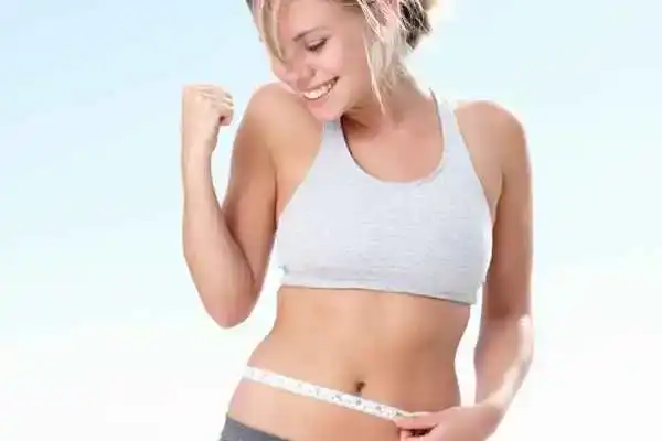 Unraveling the Mystery: Where Does the Body Fat Loss From First? 3 Image of woman happy with fat loss Newbury